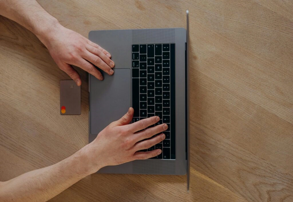 Laptop and credit card - Online shop payment integration