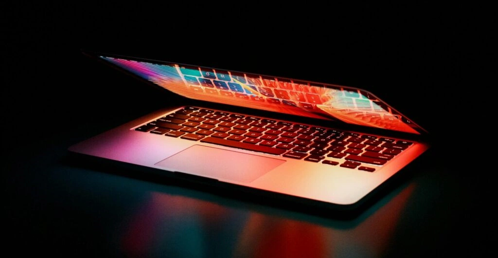 Laptop displaying colorful screen - Business Automation