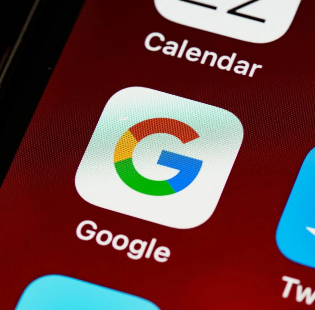 Google Ads icon on smartphone - ZeroMaze Agency