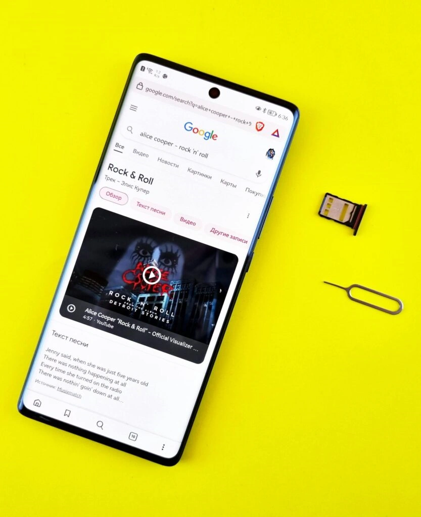 Smartphone displaying Google search results for Alice Cooper - Rock & Roll